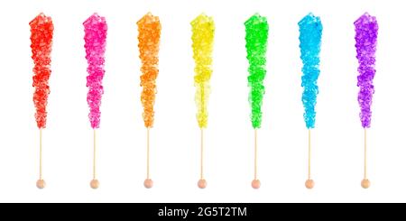 Row of Seven Rainbow Colored Rock Candies on a Stick Stock Photo