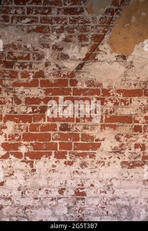 brick and stucco wall, textured exterior background Stock Photo