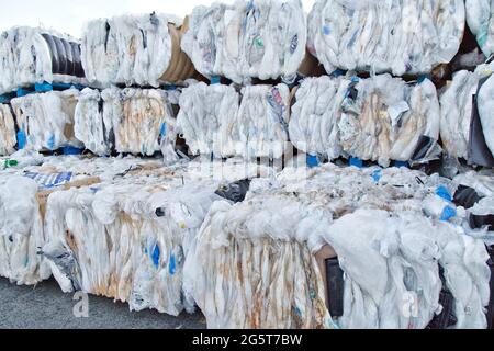 Compacted, baled plastics to be recycled Stock Photo - Alamy