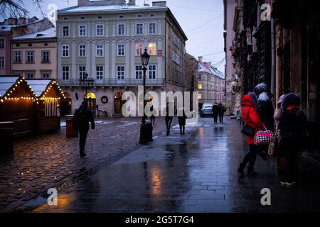 Ukraine, Eastern Europe, Western Ukraine, Lviv (Lvov), Woman Walking  Through Market Square (Ploscha Rynok Stock Photo - Alamy