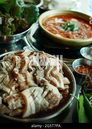 High angle view of sliced Jokbal (Korean pig's trotters) in a restaurant Stock Photo