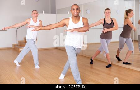 Group of activity people practicing dance techniques Stock Photo