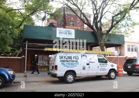 New York, USA. 15th June, 2021. Shrouded behind scaffolding is the former home of US musician Louis Armstrong. After the death of his wife in 1983, the red brick house now belongs to the city of New York, has been preserved almost in its original state inside and has been a museum since 2003. 'Satchmo' died on 06.07.1971 - he is still considered one of the best trumpeters in jazz history. (to dpa portrait 'Louis Armstrong: 50 years ago the 'King of Jazz' died) Credit: Christina Horsten/dpa/Alamy Live News Stock Photo