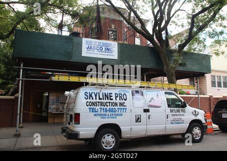 New York, USA. 15th June, 2021. Shrouded behind scaffolding is the former home of US musician Louis Armstrong. After the death of his wife in 1983, the red brick house now belongs to the city of New York, has been preserved almost in its original state inside and has been a museum since 2003. 'Satchmo' died on 06.07.1971 - he is still considered one of the best trumpeters in jazz history. (to dpa portrait 'Louis Armstrong: 50 years ago the 'King of Jazz' died) Credit: Christina Horsten/dpa/Alamy Live News Stock Photo