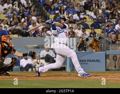 Los Angeles, United States. 30th June, 2021. Los Angeles Dodgers infielder Max Muncy hits a solo home run off San Francisco starting pitcher Kevin Gausman during the third inning at Dodger Stadium in Los Angeles on Tuesday, June 29, 2021. The Dodgers defeated the Giants 3-1 for the sweep. Photo by Jim Ruymen/UPI Credit: UPI/Alamy Live News Stock Photo