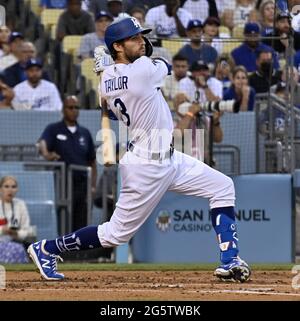 Los Angeles, United States. 30th June, 2021. Los Angeles Dodgers Chris Taylor hits a looper off San Francisco Giants starting pitcher Kevin Gausman that landed just fair for a double, scoring Max Muncy and Justin Turner during the first inning at Dodger Stadium in Los Angeles on Tuesday, June 29, 2021. The Dodgers defeated the Giants 3-1 for the two-game sweep of their National League West rivals. Photo by Jim Ruymen/UPI Credit: UPI/Alamy Live News Stock Photo