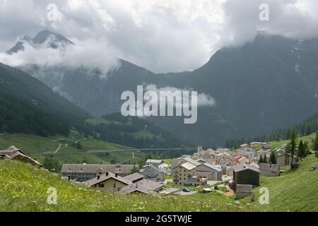 View of Simplon-dorf, a village located on the Simplon pass, the road can be seen in the background Stock Photo