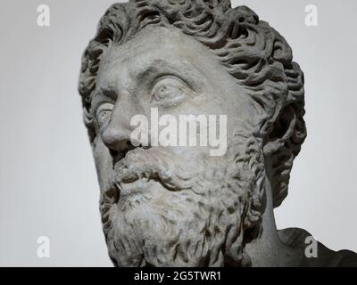 Sculpture of Marco Aurelio (Marcus Aurelius) ancient roman emperor marble head background closeup Stock Photo