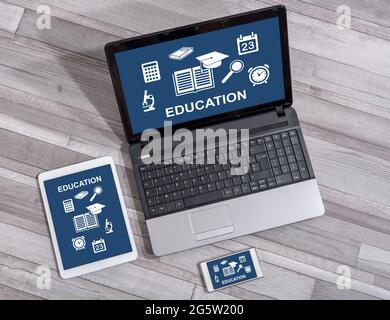 Education concept shown on different information technology devices Stock Photo