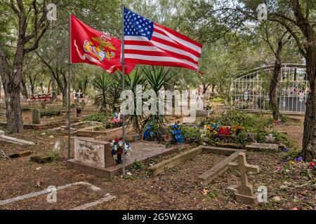 Grave of U.S. Marine Corps veteran, lance corporal Ramon Estrada, at historic cemetery in San Benito, Rio Grande Valley, Texas, USA Stock Photo
