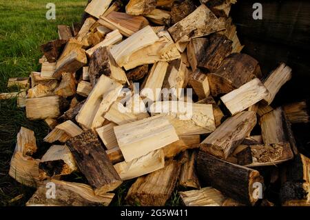 large stack of split firewood Stock Photo