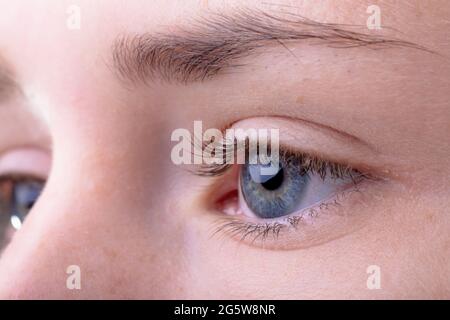 Close up of face and blue eyes of caucasian businesswoman Stock Photo