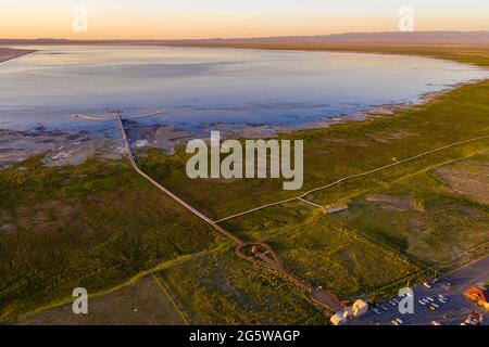 Beijing, China. 29th June, 2021. Aerial photo taken on June 29, 2021 shows a view of the Barkol Lake scenic spot along the Beijing-Urumqi Expressway in northwest China's Xinjiang Uygur Autonomous Region. Credit: Hu Huhu/Xinhua/Alamy Live News Stock Photo