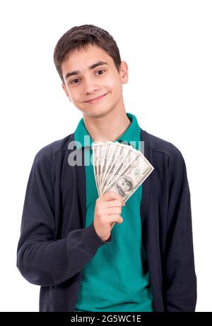 financial, planning, childhood and concept - smiling boy holding dollar cash money in his hand over white background Stock Photo