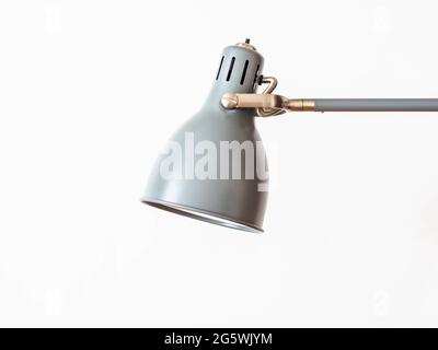 Gray home metal shade lamp with rotary mechanism on white background. Front view. copy space Stock Photo