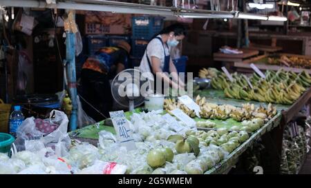 Shop Owner Klong Toey Market Wholesale Wet Market Bangkok Thailand largest food distribution center in Southeast Asia Stock Photo