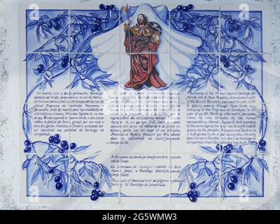 Blue tile azulejos with the story of Saint James (Santiago) on a mural on the Camino in Portugal. Stock Photo