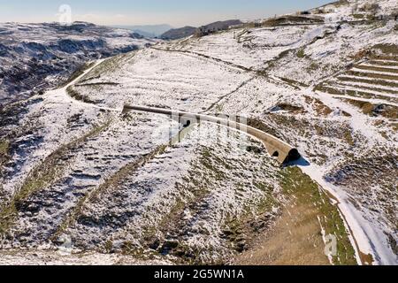 Abandoned train tunnel in snow Stock Photo