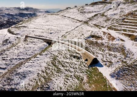 Abandoned train tunnel in snow Stock Photo