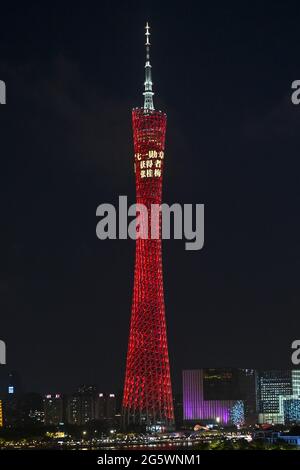 Guangzhou, China. 30th June, 2021. The Canton tower turns red to congratulate the gainer of the July 1's Medal in Guangzhou, Guangdong, China on 30th June, 2021.(Photo by TPG/cnsphotos) Credit: TopPhoto/Alamy Live News Stock Photo