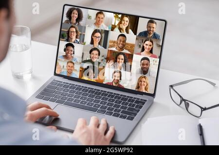 Multiethnic group of people using laptop for online conference meeting, creative collage Stock Photo