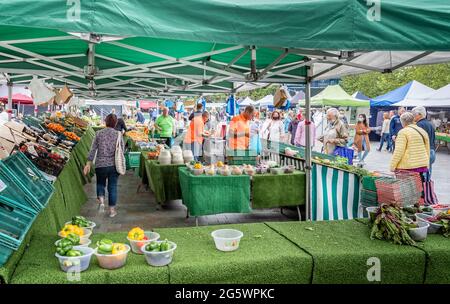 Fruit and vegetable stall at the Tuesday outdoor market at The Market Place in Salisbury, Wiltshire, UK on 29 June 2021 Stock Photo