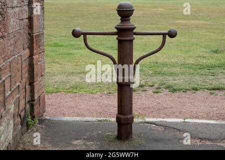 Rusting old footpath end barrier in a public park Stock Photo
