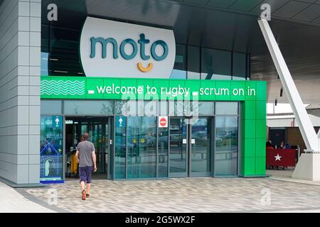 Entrance & welcome sign on new Moto Rugby M6 motorway services shops & toilet facilities Covid pandemic restrictions in place Warwickshire England UK Stock Photo