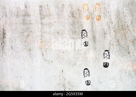 grey concrete wall with foot steps. texture background. Brickwork or stonework flooring interior rock old pattern stone design stack. Stock Photo