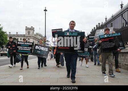 London, UK. 30th June 2021. Martin Goss is a Liberal Democrats attend the #Silent4 abandoned by the government throughout the pandemic, all at National Covid Memorial Wall, Lambeth Palace on 30th June 2021, London, UK. Credit: Picture Capital/Alamy Live News Stock Photo