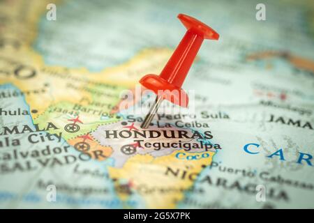 Location Honduras, red push pin on the travel map, marker and point closeup, tourism and trip concept, North America Stock Photo