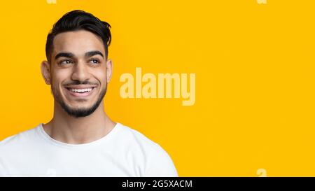 Happy middle-eastern man looking at copy space Stock Photo