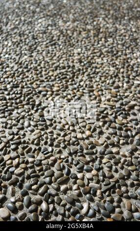 Natural cobblestone background. Stone road. Natural cobblestone background, stone road. Stock Photo