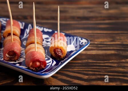 Traditional British Pigs in the Blank with Toothpicks Stock Photo