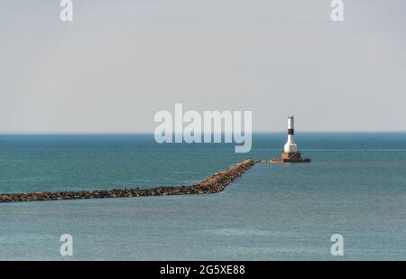 The Lighthouse at Conneaut Beach on Lake Erie Stock Photo