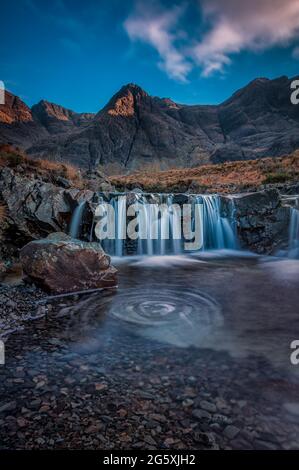 The Fairy Pools. At foot of the Black Cuillins near Glenbrittle are the Fairy Pools, beautifully crystal clear blue pools on the River Brittle. Stock Photo