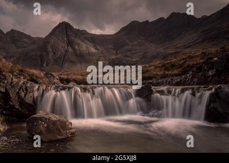 The Fairy Pools. At foot of the Black Cuillins near Glenbrittle are the Fairy Pools, beautifully crystal clear blue pools on the River Brittle. Stock Photo