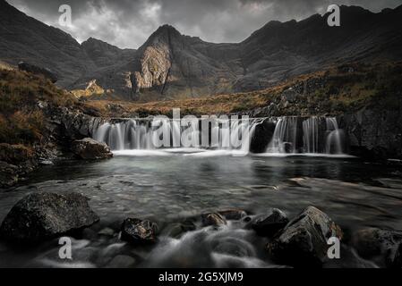 The Fairy Pools. At foot of the Black Cuillins near Glenbrittle are the Fairy Pools, beautifully crystal clear blue pools on the River Brittle. Stock Photo