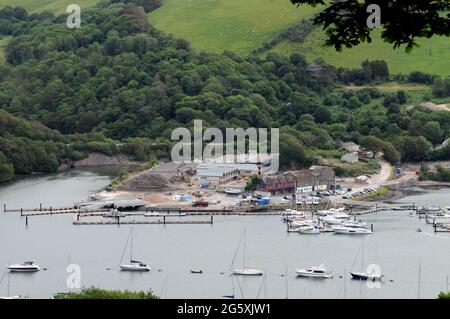 View across the River Dart to the old Philip and Sons, shipbuilders, yard. Ship building ceased in the late 1990s, having survived since 1858. Stock Photo