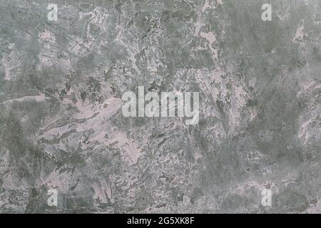 Green background with white grainy paint. Stock Photo
