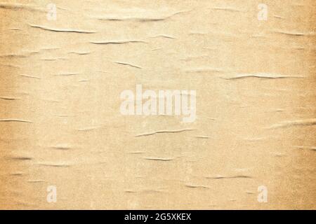 Wrinkled old paper poster template. Vintage creased distressed plakat background Stock Photo