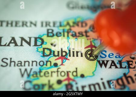 Location Dublin in Ireland, push pin on map closeup, marker of destination for travel, tourism and trip concept, Europe Stock Photo