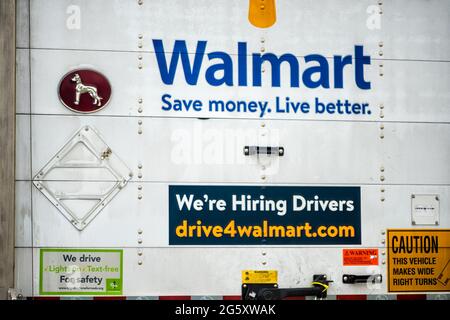Lexington, USA - May 27, 2021: Highway road in Virginia with truck delivery vehicle for Walmart and sign for hiring drivers application on online webs Stock Photo