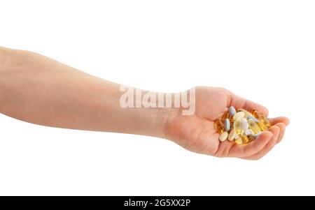 vitamin pills in hand path isolated on white Stock Photo