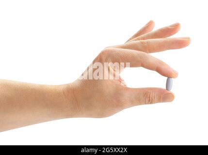 vitamin pill in hand path isolated on white Stock Photo