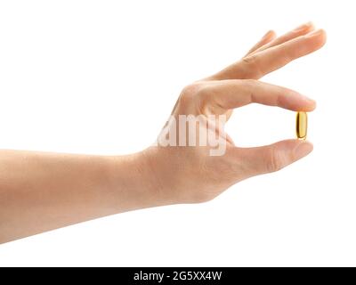 vitamin pill in hand path isolated on white Stock Photo