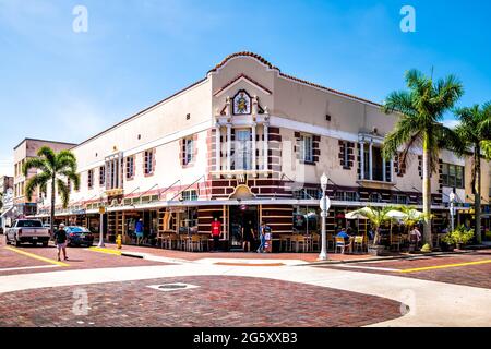 Fort Myers, USA - April 29, 2018: Florida gulf of mexico city downtown with people outside restaurant United Ale House in historic building Stock Photo