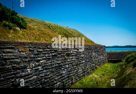 the dry moat that circles fort charlotte Stock Photo