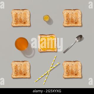 Pattern with toast and lemon jam on gray background Stock Photo