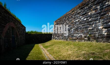 the dry moat that circles fort charlotte Stock Photo